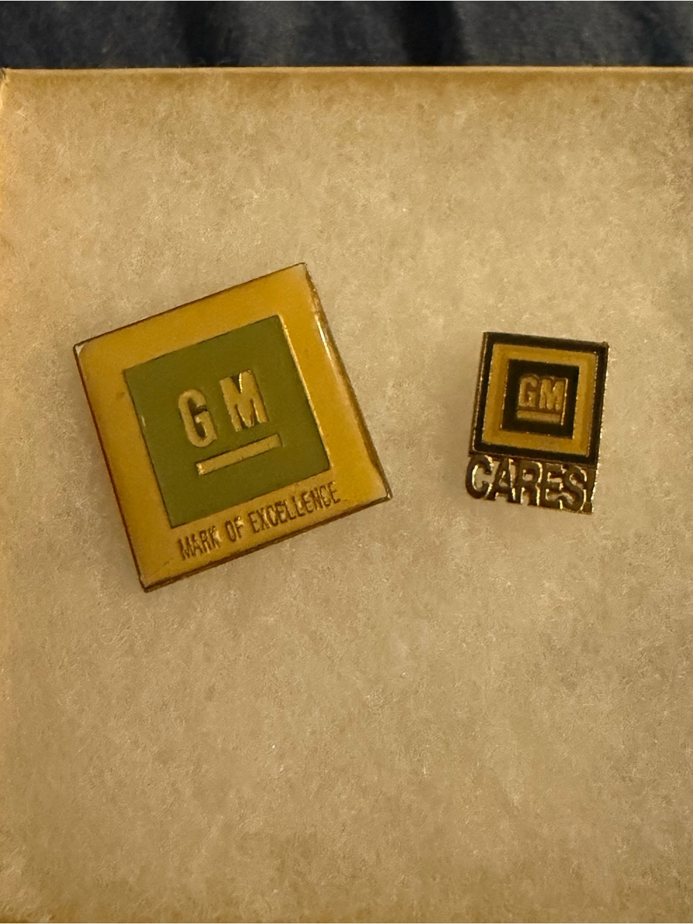 Vtg GM CARES Lapel Hat Tie Pin General Motors Automotive